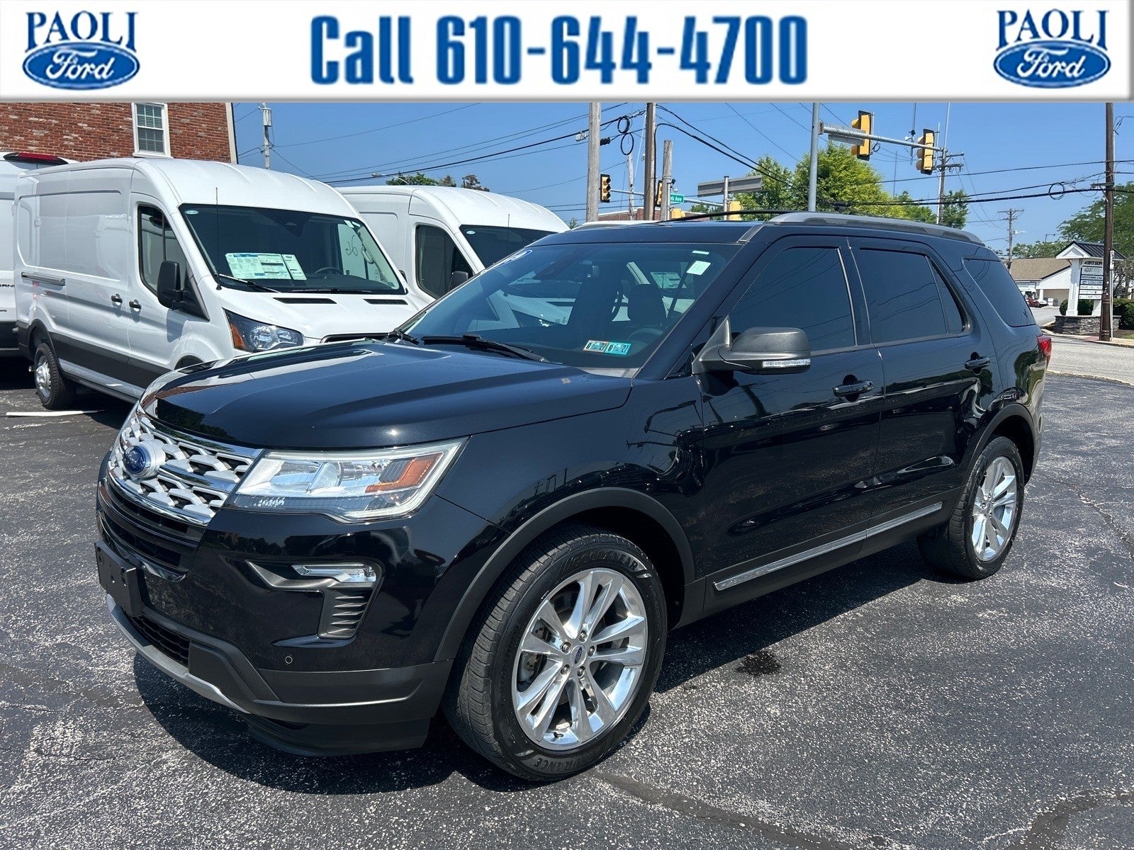 2019 Ford Explorer XLT in Agate Black Metallic — front three-quarter view