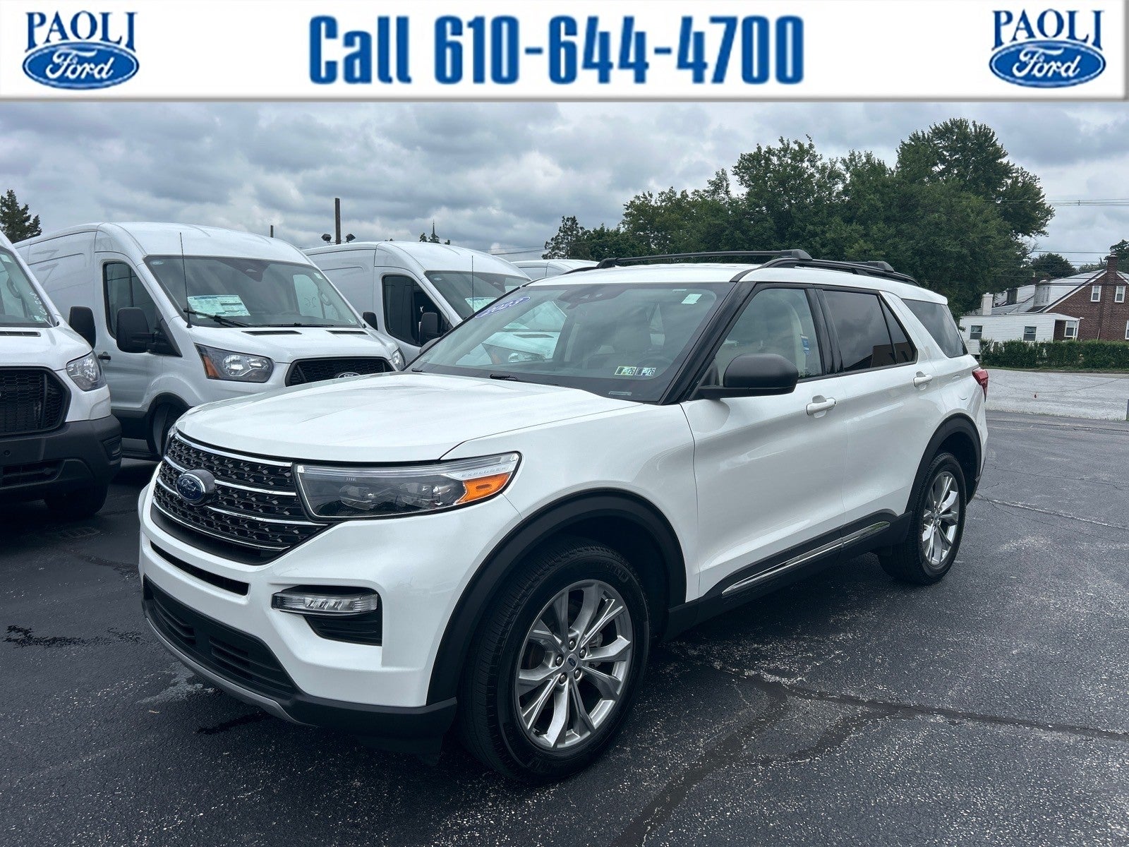 2023 Ford Explorer XLT in White Metallic — front three-quarter view