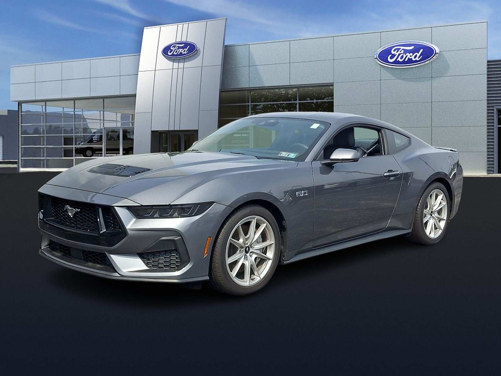 2025 Ford Mustang GT Premium in Carbonized Gray Metallic — front three-quarter view