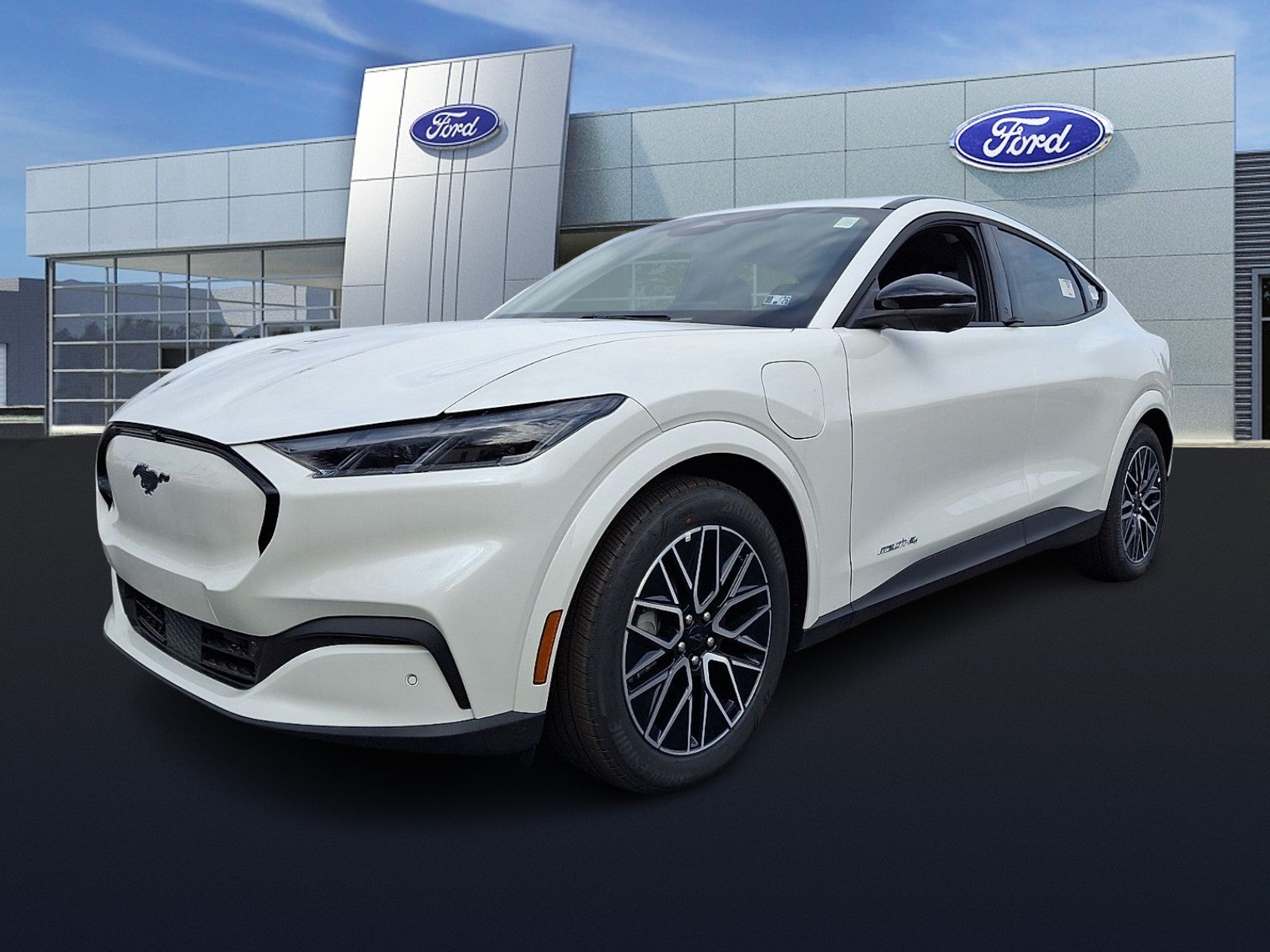 2025 Ford Mustang Mach-E Premium in Star White Metallic Tri-Coat — front three-quarter view