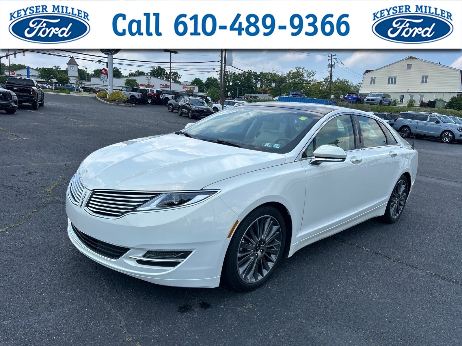 2013 Lincoln MKZ Base in Champagne Metallic — front three-quarter view
