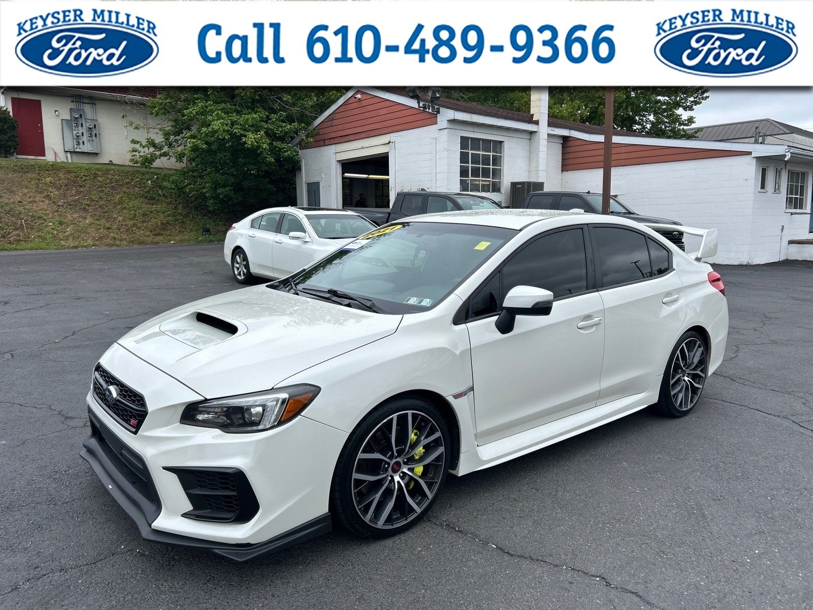 2021 Subaru WRX STi in Crystal White Pearl — front three-quarter view